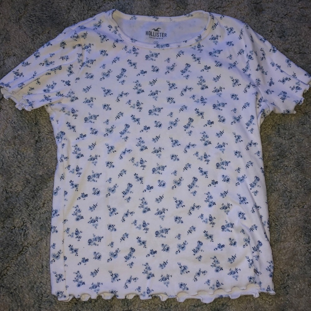 Hollister white shirt with blue flower design